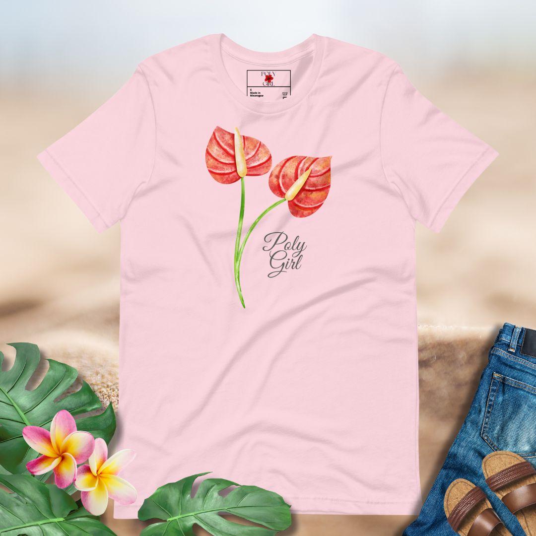 Pink t-shirt with floral design and 'Pretty Girl' text on a neutral background