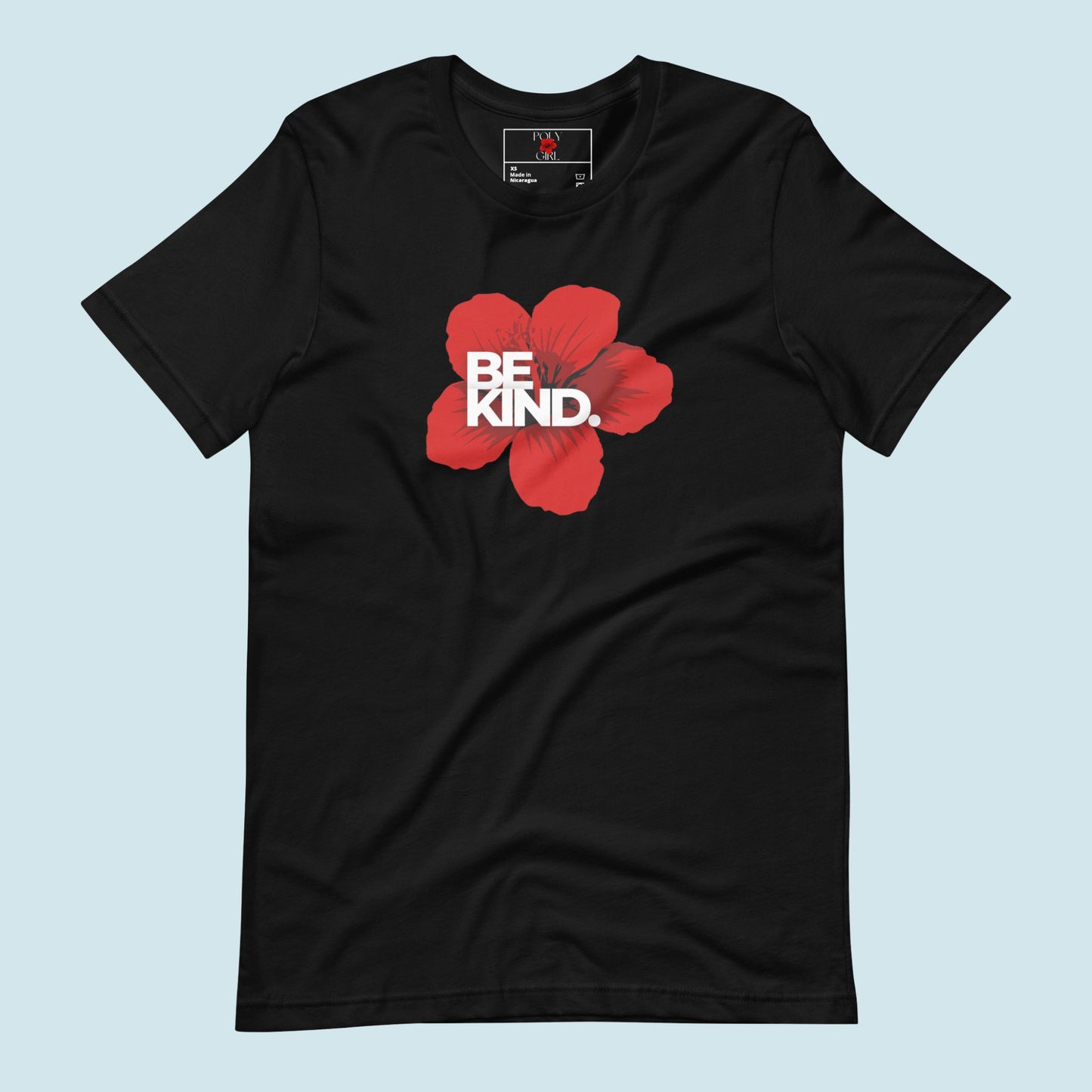 Black t-shirt with a red flower and 'BE KIND' text on a light blue background