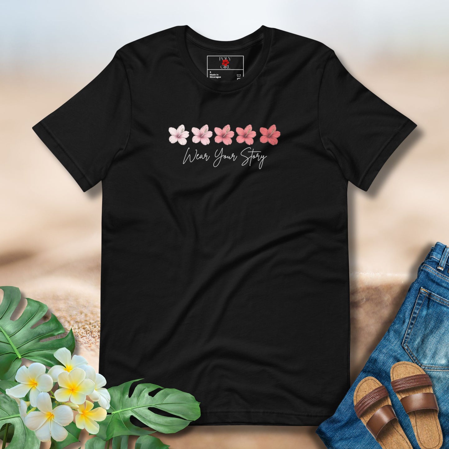 Floral Poly Girl shirt with five hibiscus design and our signature slogan, Wear Your Story