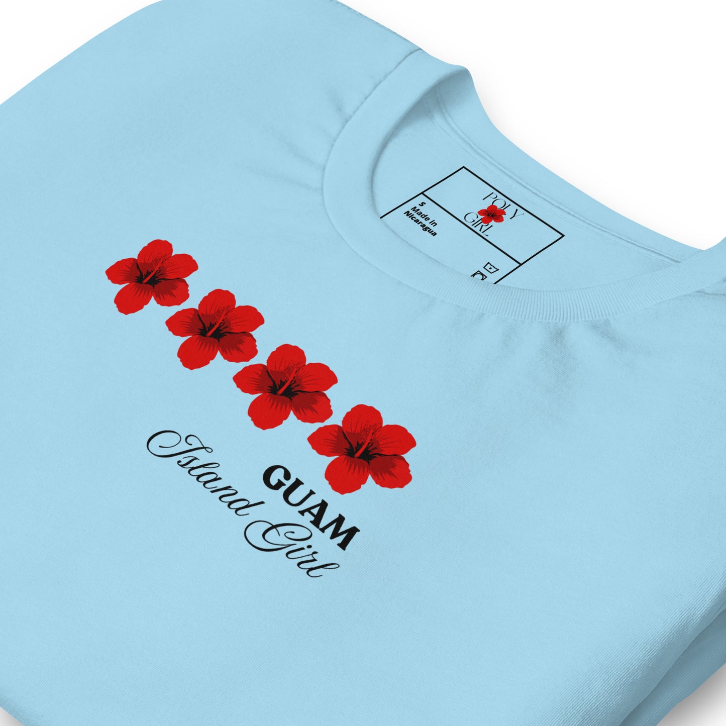 Folded blue t-shirt, Guam Island Girl, by Poly Girl, The Island Girl's Brand