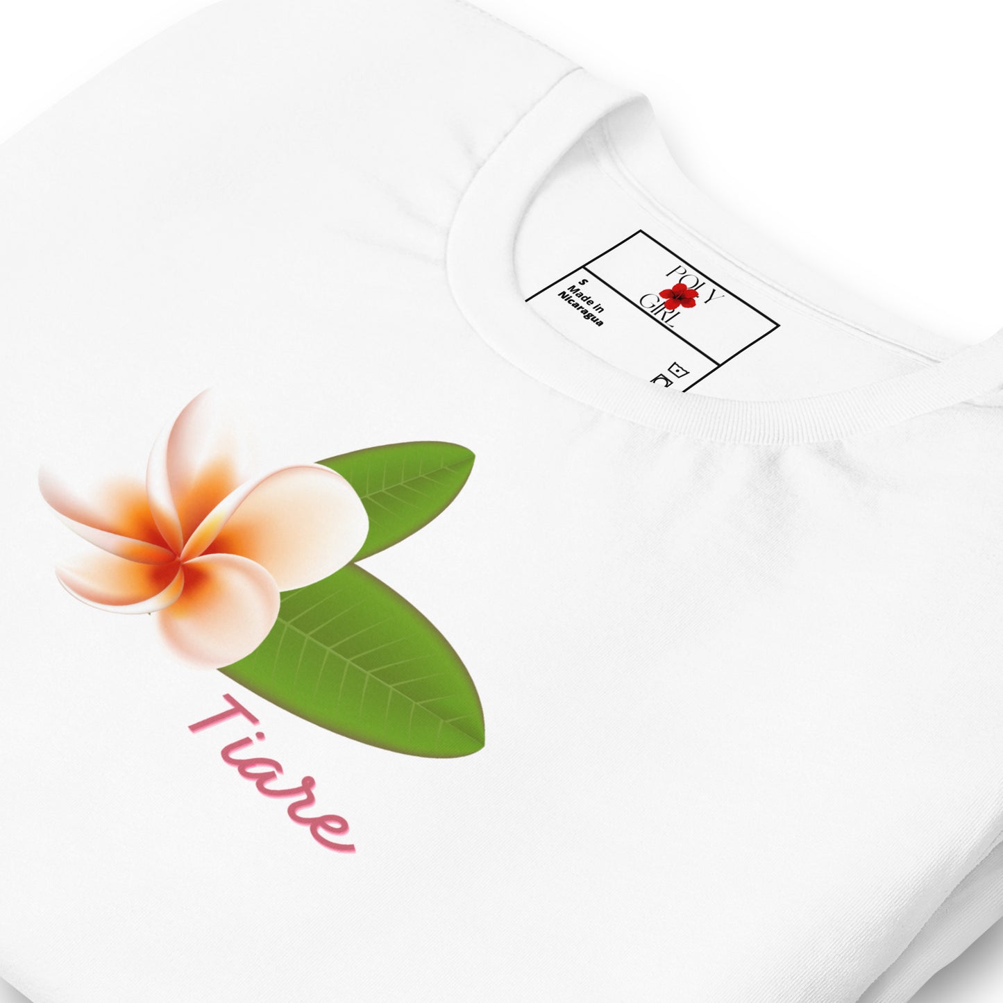 White t-shirt with a floral design and 'Tiaré' text on a white background