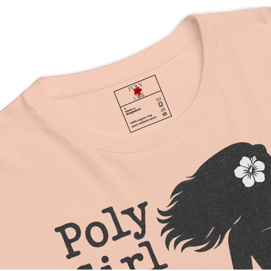 Pink t-shirt with 'Poly Girl' design and brand label on a white background