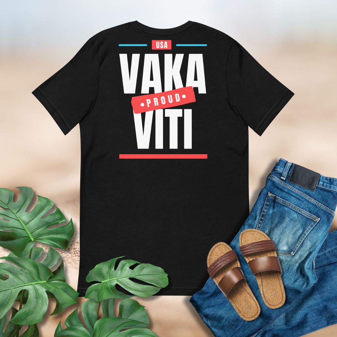 Black t-shirt with 'Vaka Proud Viti' text, paired with jeans and sandals on a neutral background.
