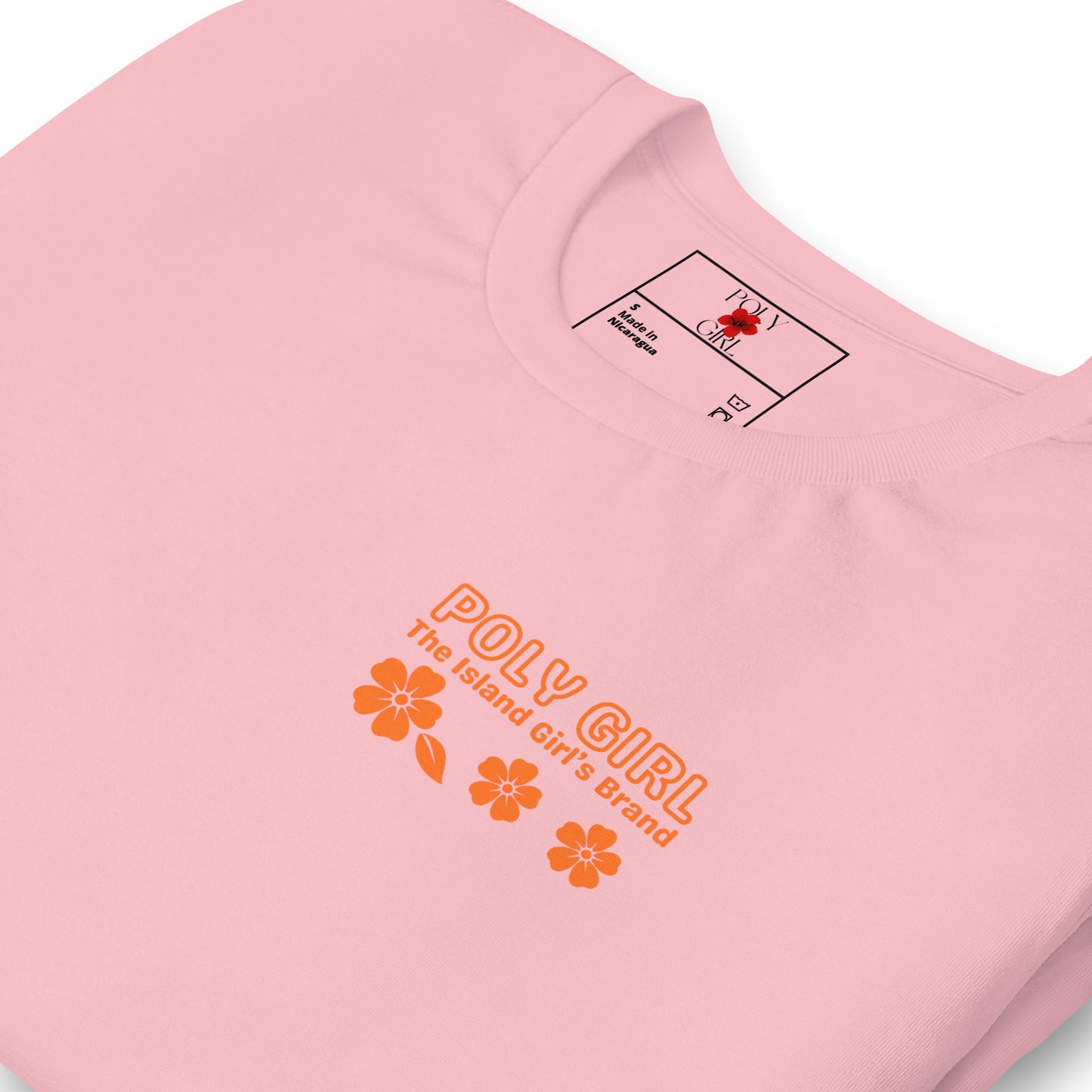 Soft pink Poly Girl tee with bold orange island design and flowers