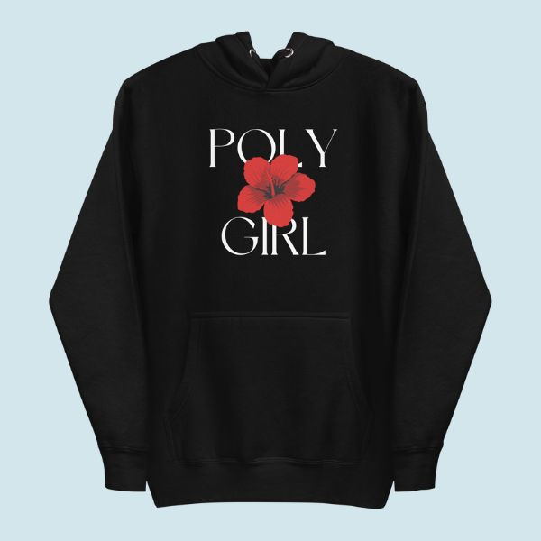 Black hoodie with 'Poly Girl' logo and a red flower on a light blue background - the island girl's brand