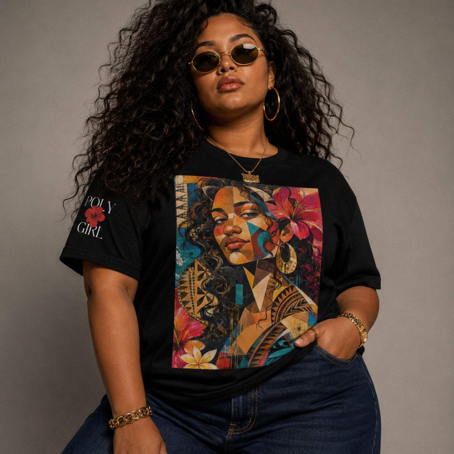 Woman wearing a black t-shirt with a colorful graphic design of a woman's face and text as part of the Painted Ladies Collection by Poly Girl