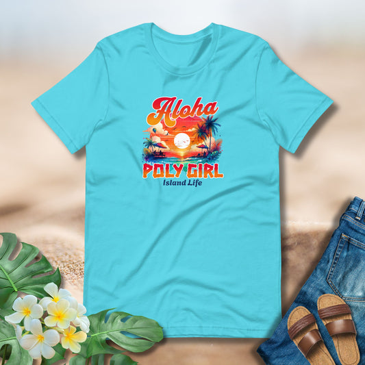 Turquoise t-shirt with 'Aloha Poly Girl Island Life' design on a sandy background with flowers and sandals.