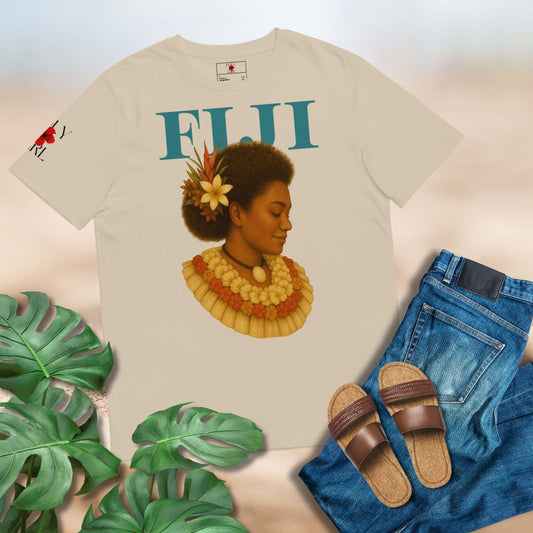 Beige t-shirt with a design of a woman and 'Fiji' text, paired with jeans and sandals on a light background.