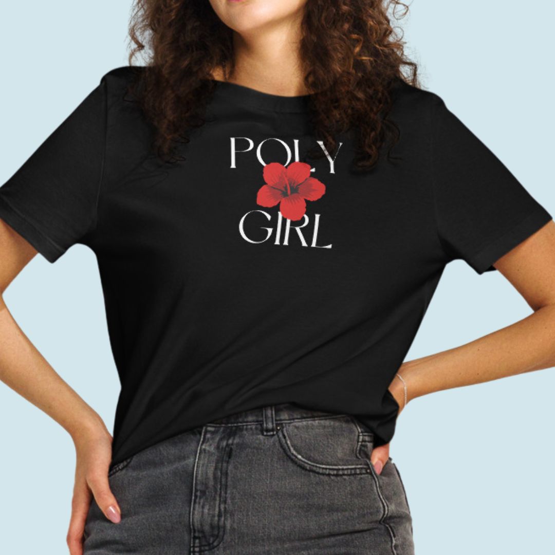 Person wearing a black t-shirt with 'Poly Girl' and a red flower design on a light blue background