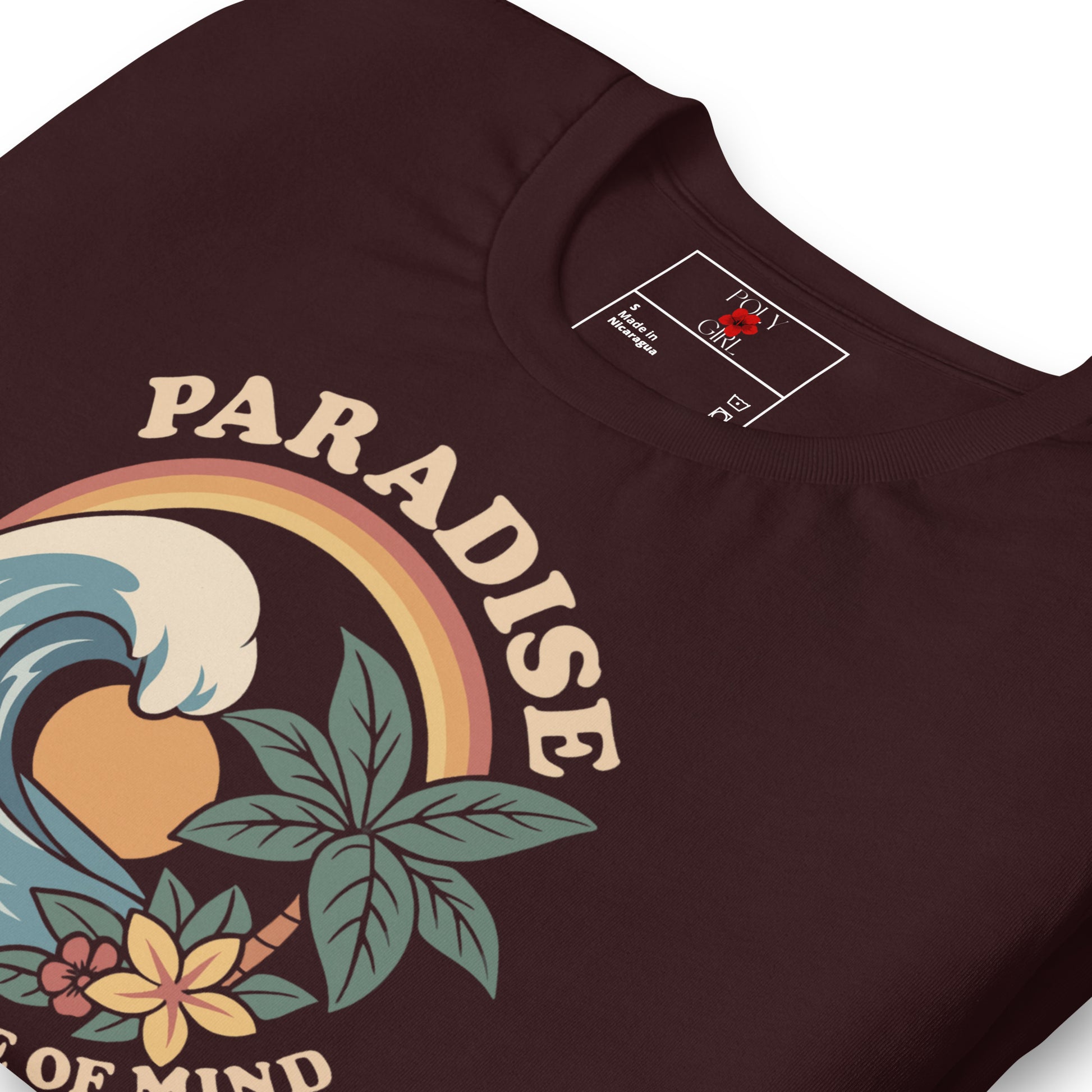 Paradise Poly Girl shirt featuring wave and island-inspired floral design
