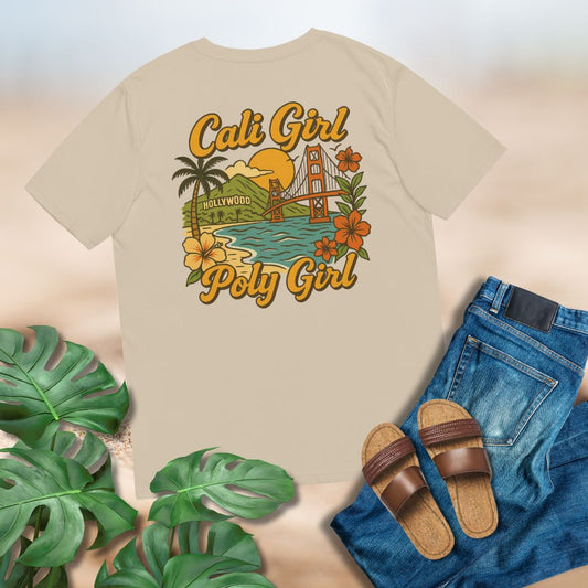 Beige t-shirt with 'Cali Girl Poly Girl' design, surrounded by green leaves, sandals, and jeans on a light beige background.