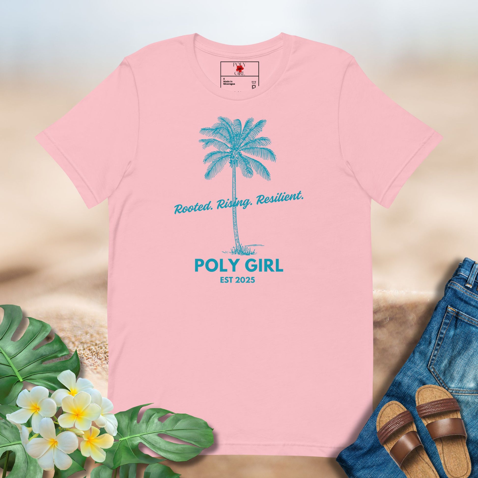 Graphic design of a coconut palm with the words Rooted, Rising, Resilient and Poly Girl on front 