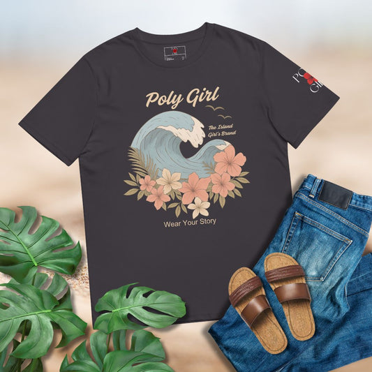 Dark Gray t-shirt with wave and floral design, surrounded by jeans, sandals, and leaves on a light background
