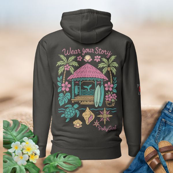 Illustrated island fale hoodie with surfboards, palm trees, waves, and floral elements by Poly Girl.