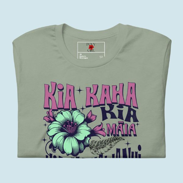 Folded Kia Kaha Kia Maia Kia Manawanui Graphic Tee in Sage by Poly Girl
