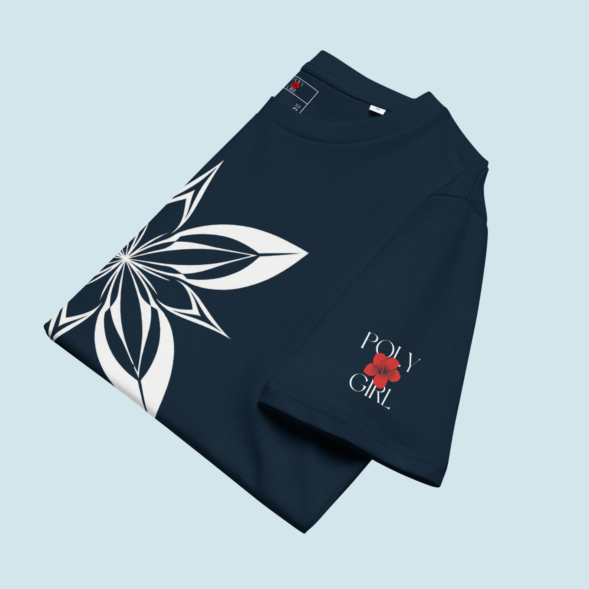 Folded Samoan Siapo tee with Poly Girl logo on sleeve