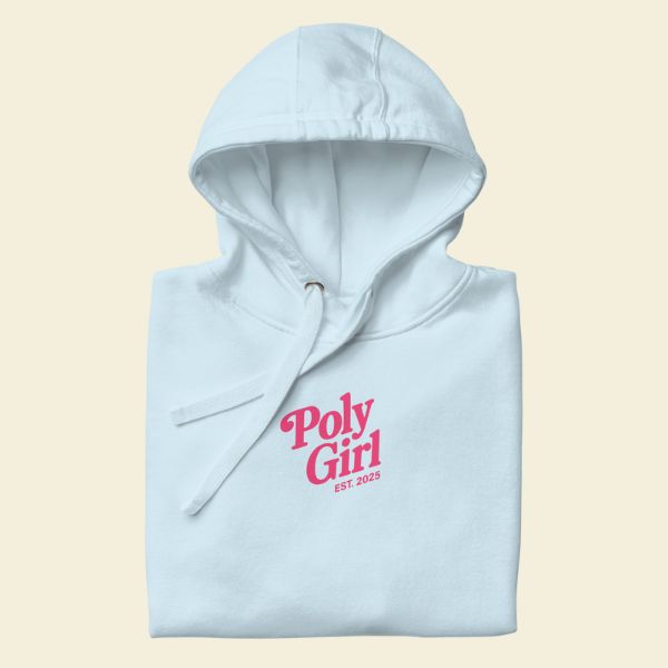 Light blue hoodie with 'Poly Girl' text on a beige background