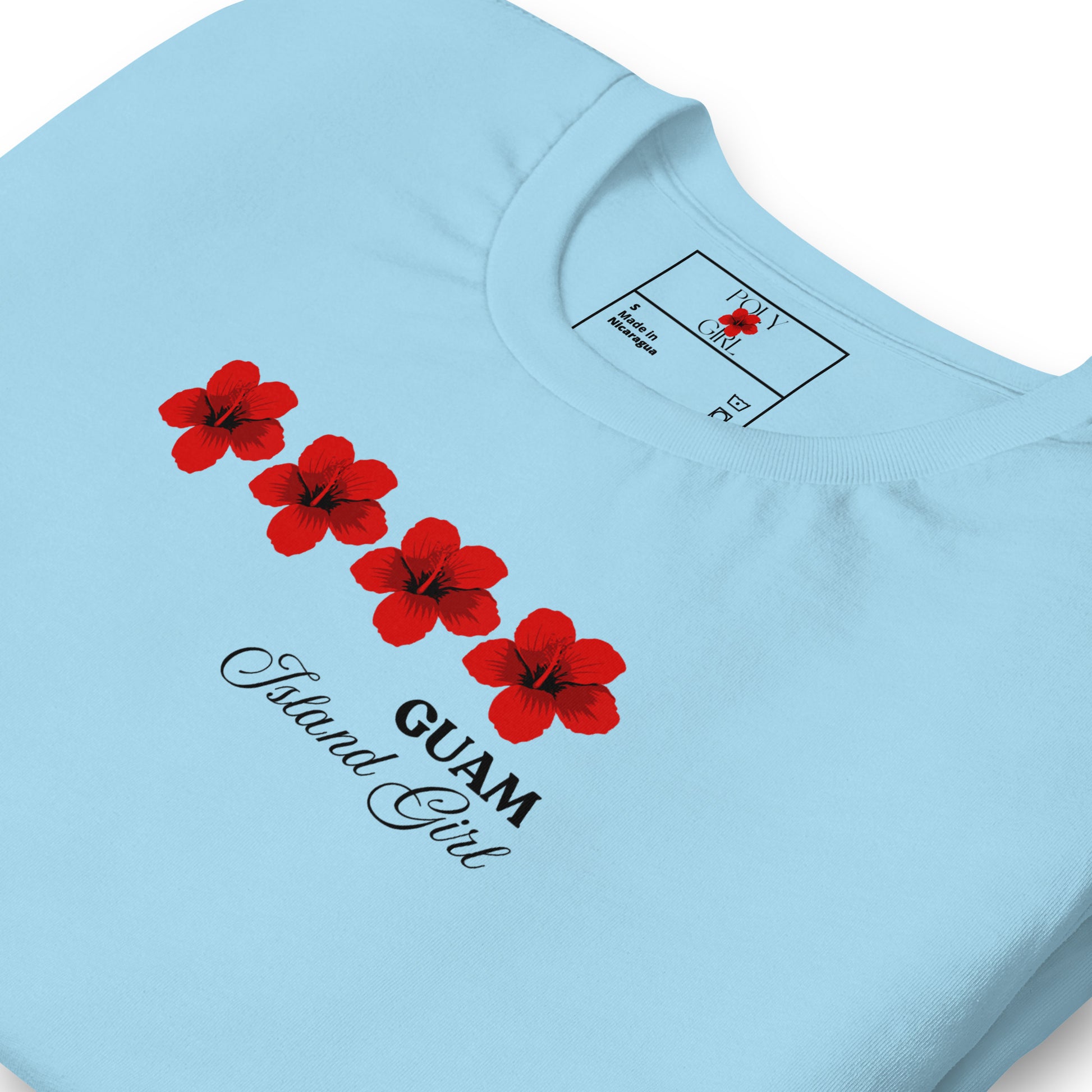 Folded blue t-shirt, Guam Island Girl, by Poly Girl, The Island Girl's Brand