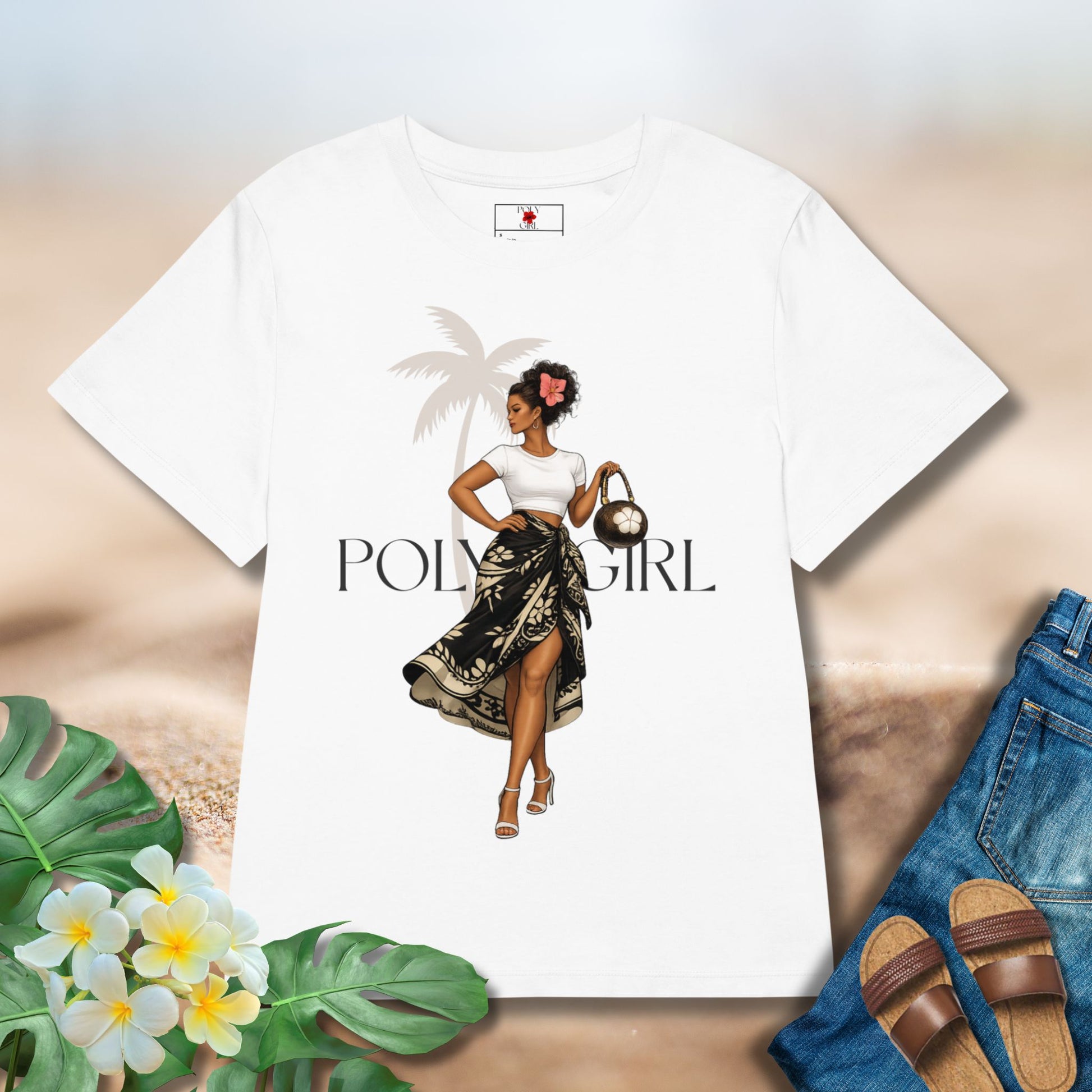 A white tshirt with  poly girl graphic design of a woman wearing a black and white wrap with a white tshirt holding a coconut purse.  