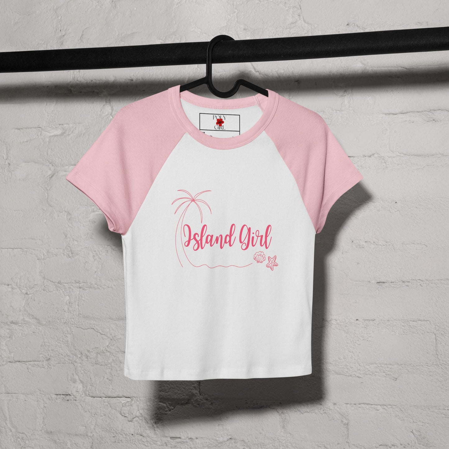 Island Girl Poly Girl Baby tee in pink and white on hanger