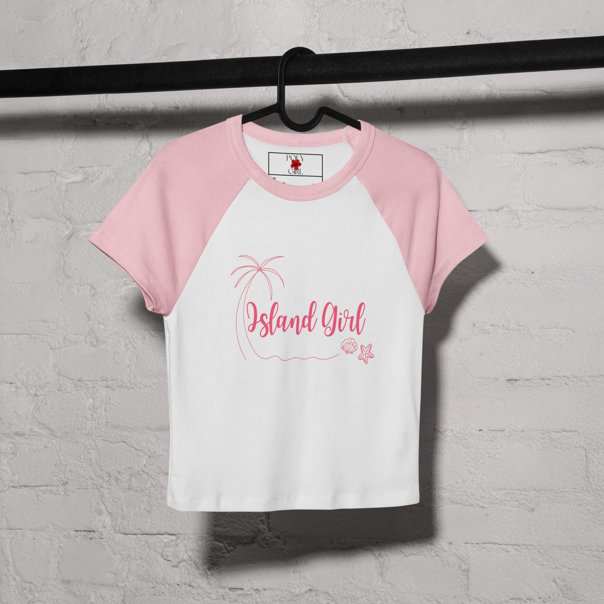 Island Girl Poly Girl Baby tee in pink and white on hanger