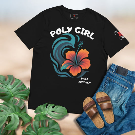 Black t-shirt design with Hibiscus and Wave with the words "It's a Mindset" by Poly Girl, paired with jeans and sandals on a neutral background.