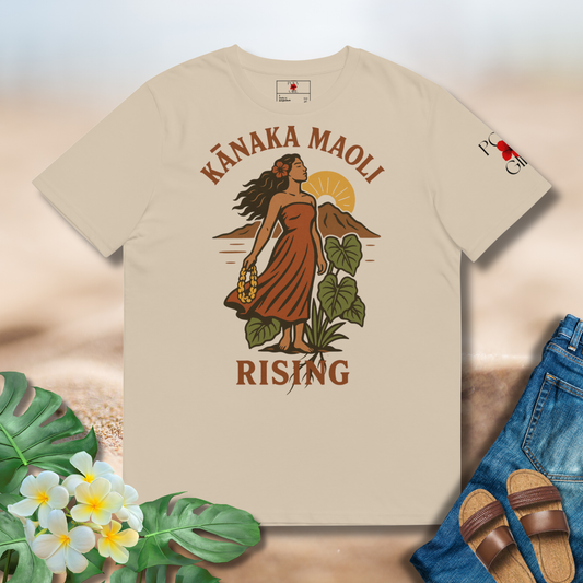 Beige t-shirt with 'Känaka Maoli Rising' design featuring a woman in an orange dress, surrounded by flowers and leaves.