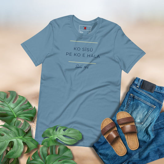 Blue t-shirt with text "Ko Sisu Pe Ko e Hala" paired with jeans, sandals, and green leaves on a gradient background