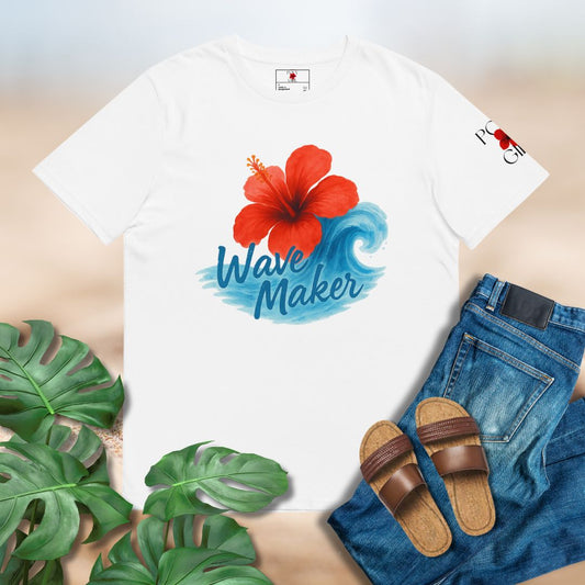 White T-shirt with image of red hibiscus on a blue wave with the words Wave Maker on the front mocked up on a sand background with jeans and sandals. Designed by Poly Girl
