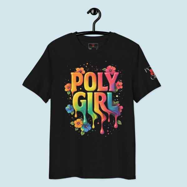 Black tee on hanger with bold Living Color design, featuring colorful splatter and scattered hibiscus flowers for a bright, energetic look 