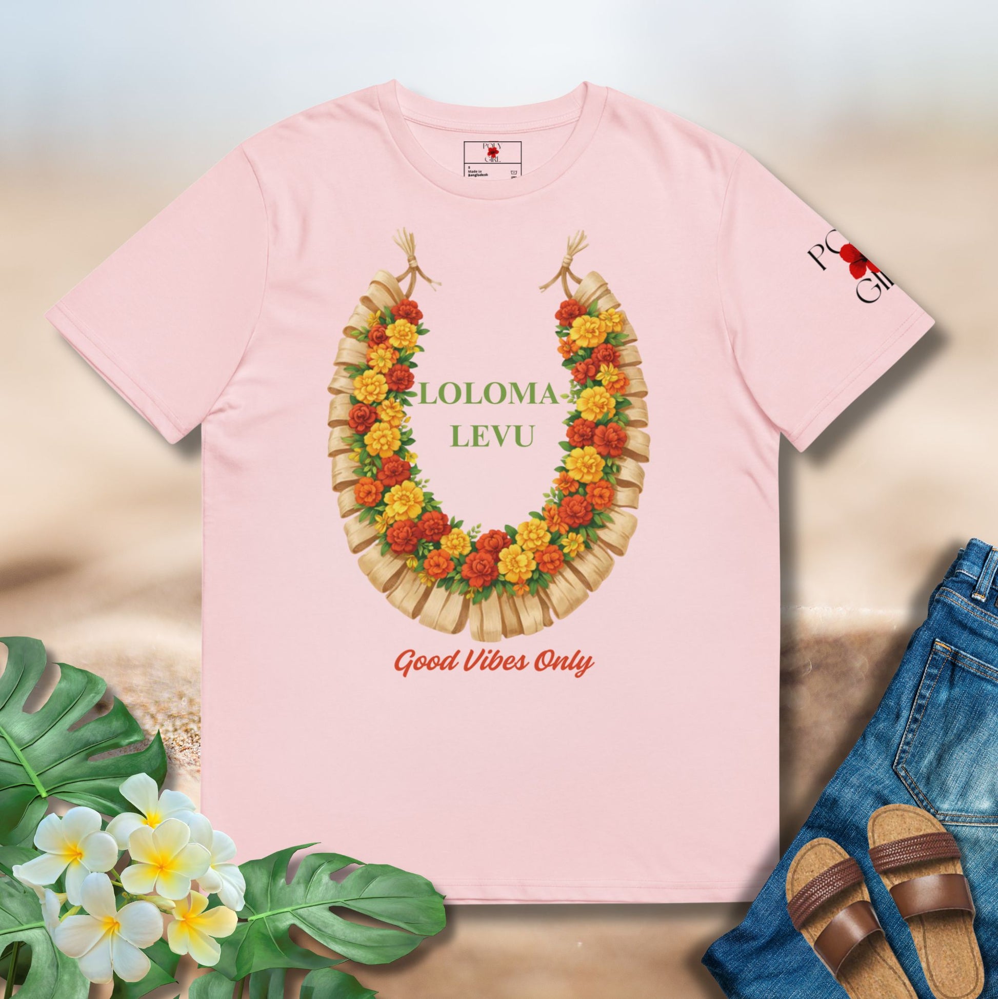 Pink tshirt of a Fijian salusalu with the words Loloma Levu and Good Vibes Only design by Poly Girl