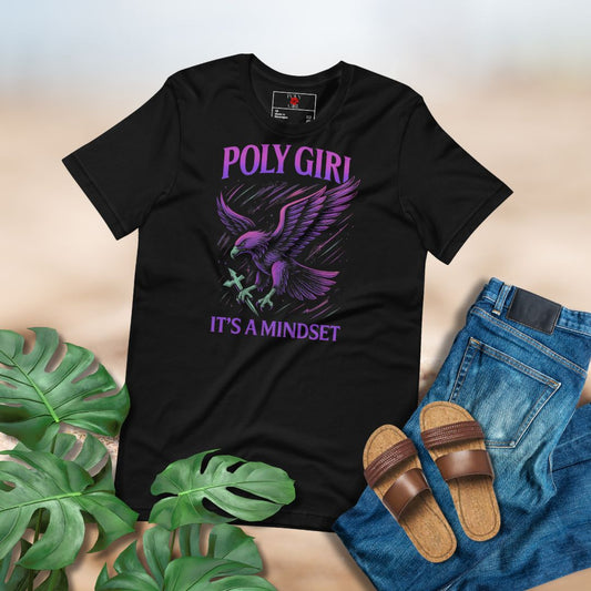 Black t-shirt with 'Poly Girl, It's a Mindset' design, paired with jeans and sandals on a neutral background.