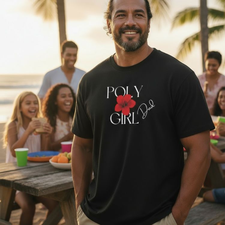 Man wearing a black t-shirt with 'Poly Girl Dad' design at a beachside gathering.