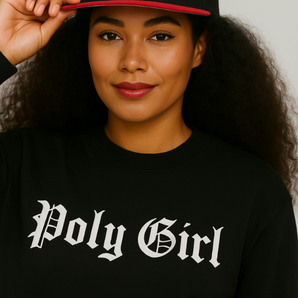 Person wearing a black shirt with 'Poly Girl' text and a red and black cap.