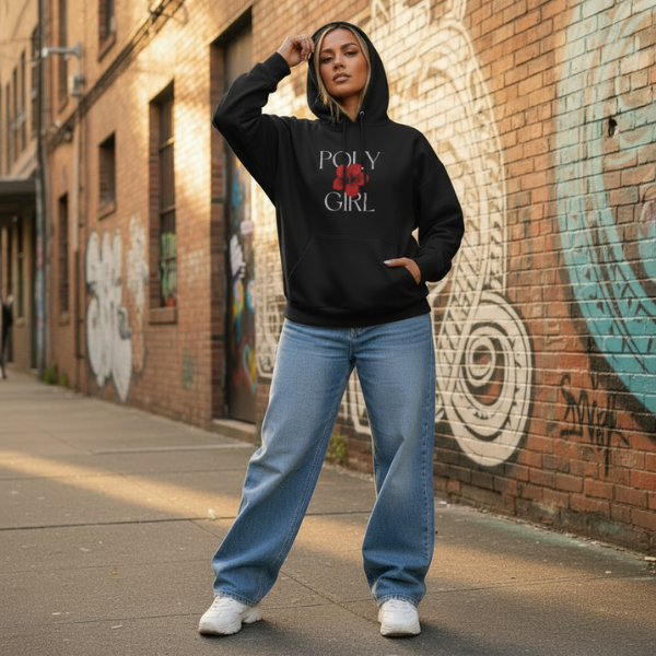 Person wearing a black hoodie with 'Poly Girl' text and red graphic, standing against a graffiti-covered wall.