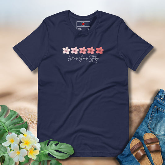 Poly Girl tee featuring five hibiscus flowers with Wear Your Story text