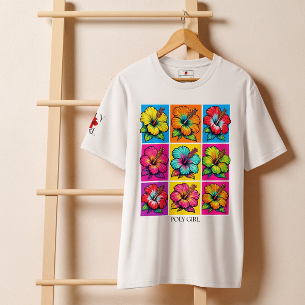 White t-shirt with colorful floral design on a wooden hanger against a beige background