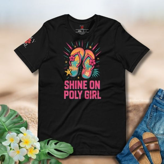 Black tee featuring colorful slippahs with tropical flowers, palm trees, stars, and the text Shine On Poly Girl