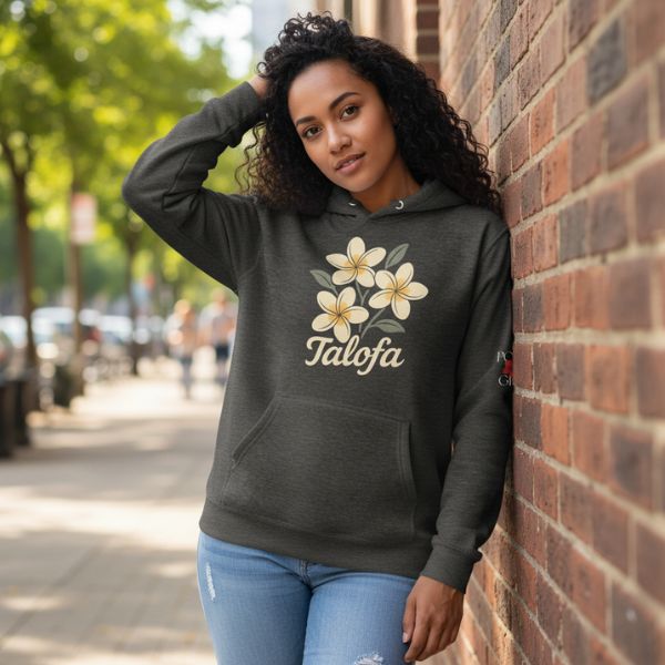 Woman leaning on a wall wearing the Talofa hoodie by Poly Girl