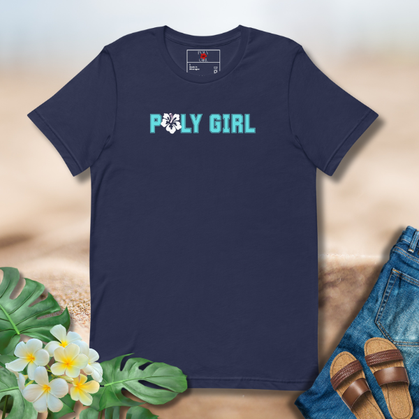 Navy blue t-shirt with 'POLY GIRL' text on a textured surface with plants and sandals.