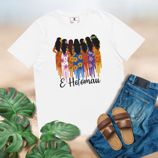 White t-shirt with colorful graphic and text, paired with jeans and sandals on a light background
