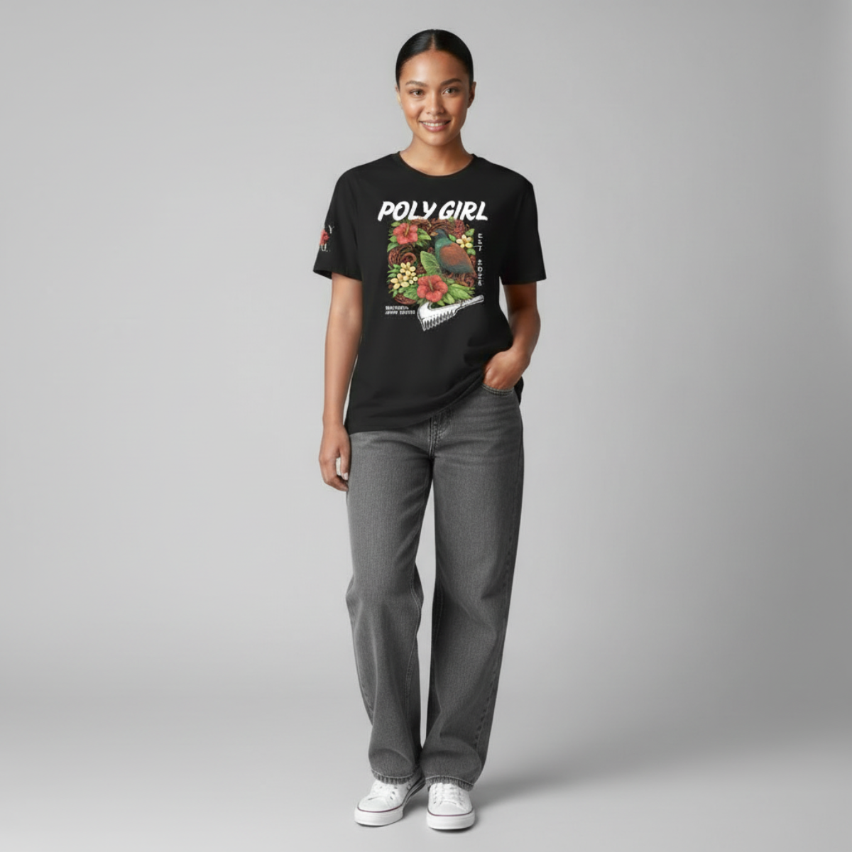 Model wearing a Samoan inspired graphic tee with rare bird, island florals, and nifo 'oti symbolism