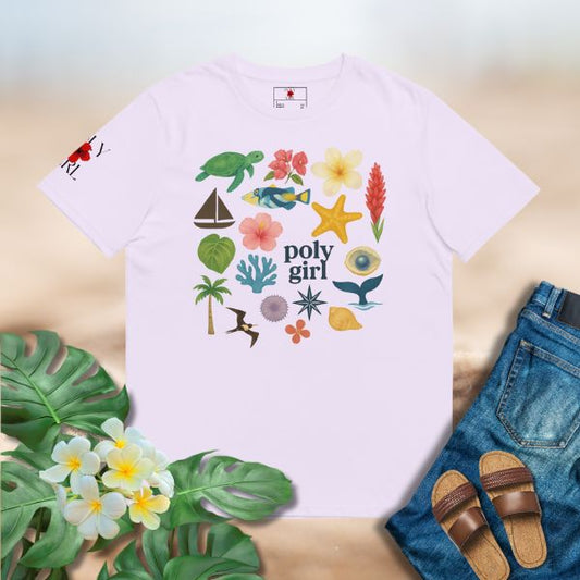 Dreaming of Paradise Tee with colorful Pacific-inspired icons including honu, flowers, coral, canoe, and palms in a playful collage design.