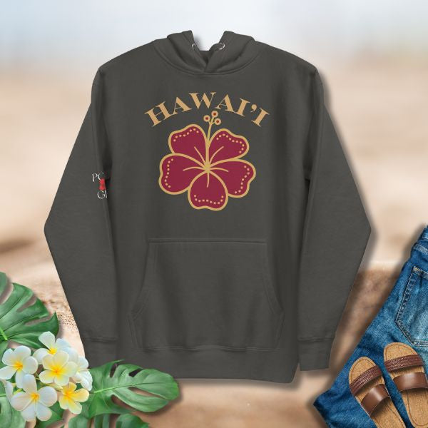 Hawai‘i Hibiscus Hoodie featuring a bold red hibiscus emblem and arched Hawai‘i lettering by Poly Girl