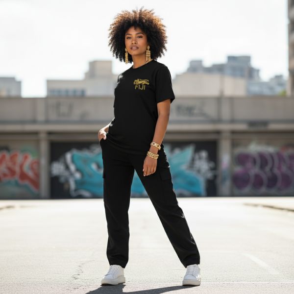 Poly Girl wearing gold Fiji tee with island pride and bold energy.