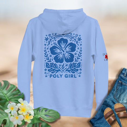 Light blue hoodie featuring a bold blue hibiscus surrounded by lace-style Polynesian motifs, titled Island Lace Hoodie by Poly Girl