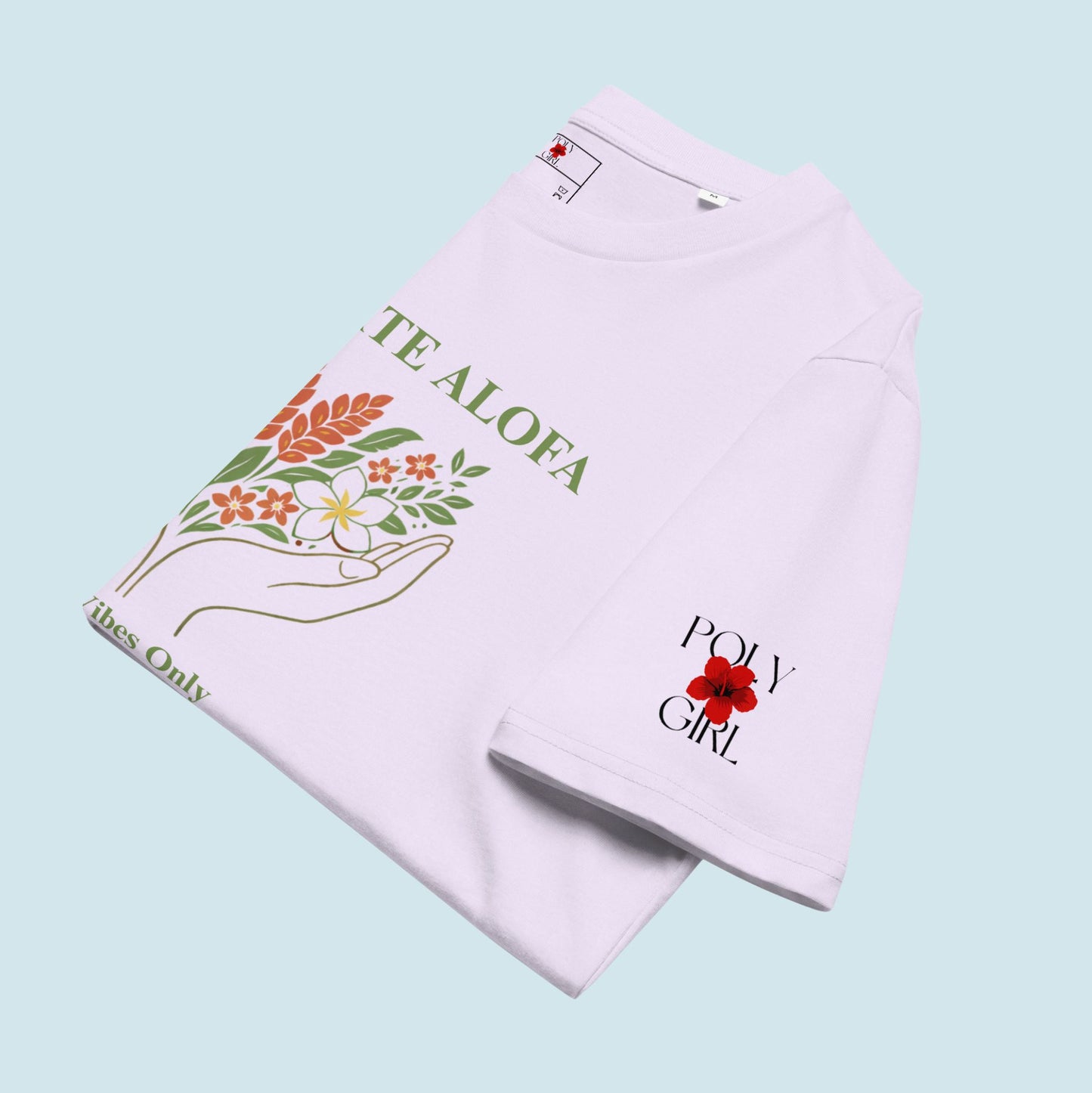 Folded Cultivate Alofa Tee with Poly Girl logo on left sleeve