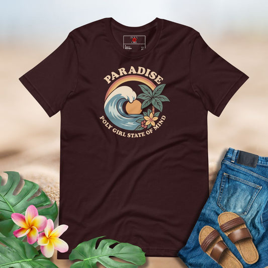 Graphic t-shirt with wave, tropical leaves, and flowers with text “Paradise Poly Girl State of Mind”