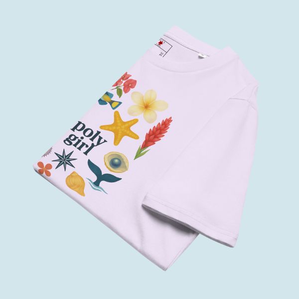 Folded pink sweatshirt with colorful graphics and 'poly girl' text on a light blue background